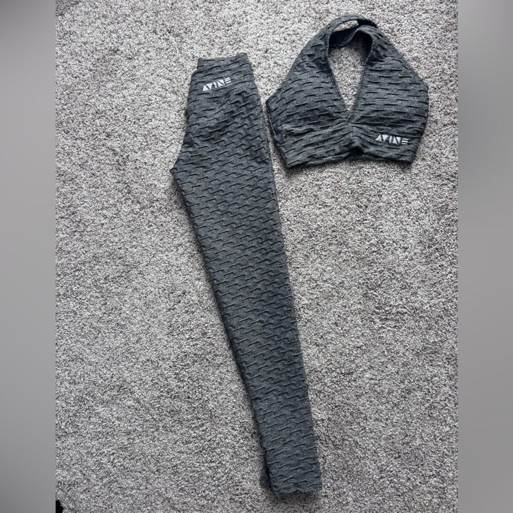 AVINE grey sports bra and matching leggings. XS. Top is NWT. Bottoms worn once!